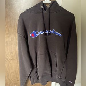 champion black hoodie mens reverse weave. With blue stitching.